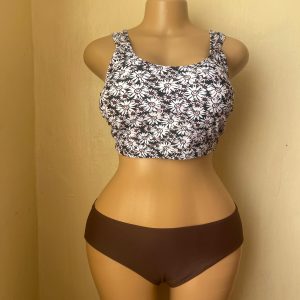 Black and white floral print top, solid brown bottoms bikini