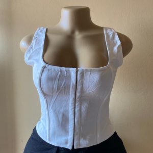 White sleeveless corset-style crop tank top